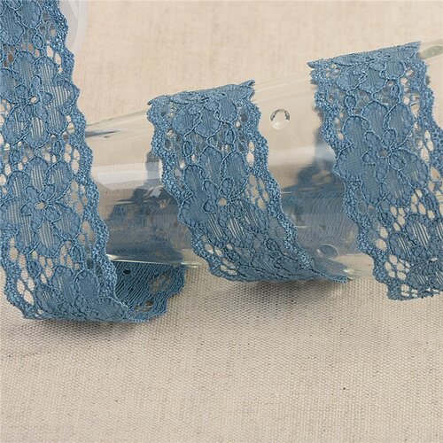 Bobine 15m dentelle élastique fleurs bleu lavande 25mm