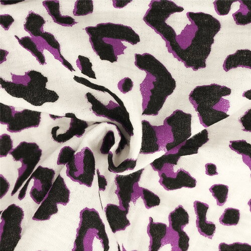Tissu double gaze imprimée léopard 130gsm leopard fond blanc au mètre