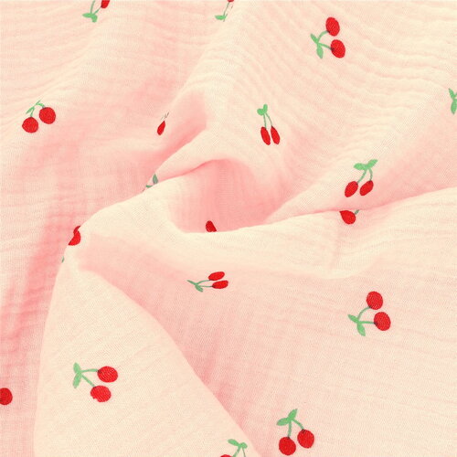 Tissu double gaze imprimée cerise fond rose au mètre