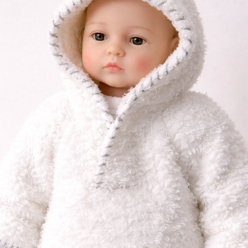 Pull à capuche tout doux en taille 1 mois.