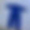 Combinaison bleu en taille 12-18 mois.