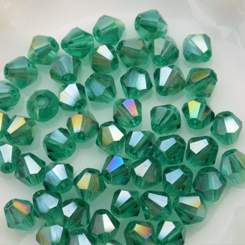 Perles cristal swarovski toupies, bicône 4 mm - vert reflets arc en ciel  (x10).