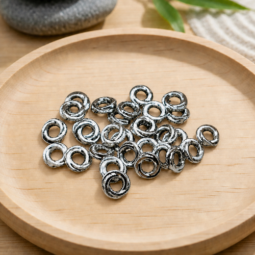 Perles intercalaires torsadées 6mm en métal argenté (lot de 30)