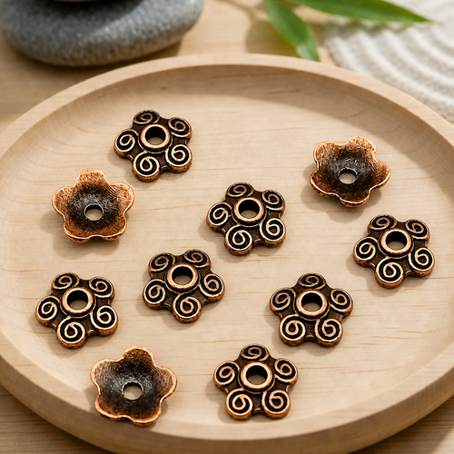 Coupelles à perles spirales en cuivre antique 10mm (lot de 10)