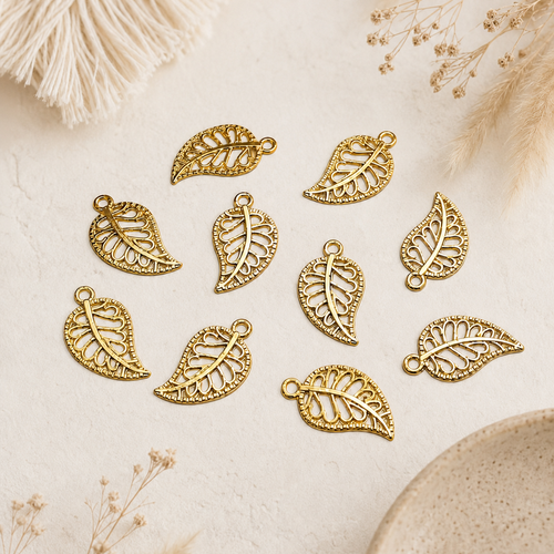 Lot de 10 breloques feuilles ajourées 10x17mm en métal doré