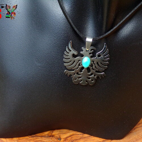 Collier ethnique ajustable - pendentif oiseau du tonnerre - bijou acier ciselé et cabochon turquoise arizona - création artisanale unique