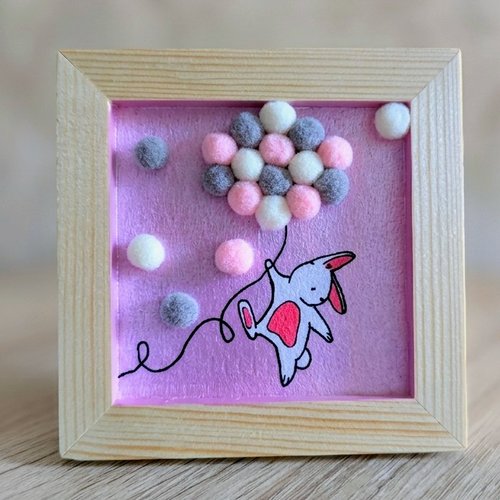 Petit cadre en bois décoratif lapin rose
