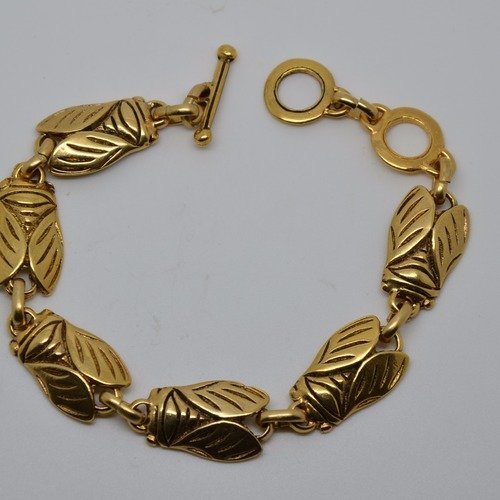Bracelet "cigales ailes striées" rené gouin en métal doré