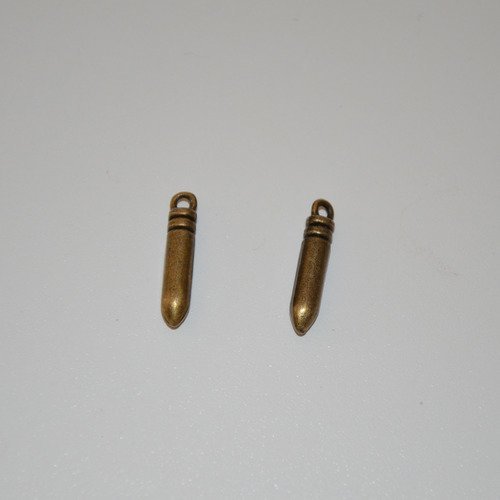 2 breloques "balle de revolver" en métal bronze