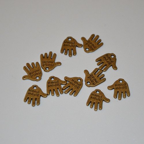 10 breloques "hand made" en métal bronze