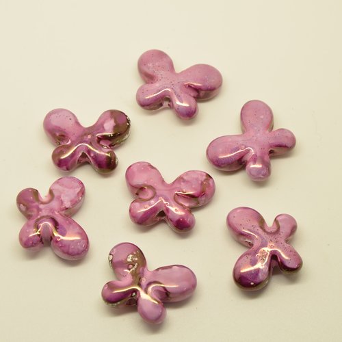 7 perles papillons en céramique - rose - 18x22mm