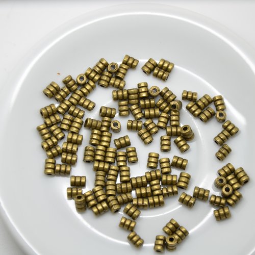 116 petites perles tubes ethniques - bronze - 6x4mm