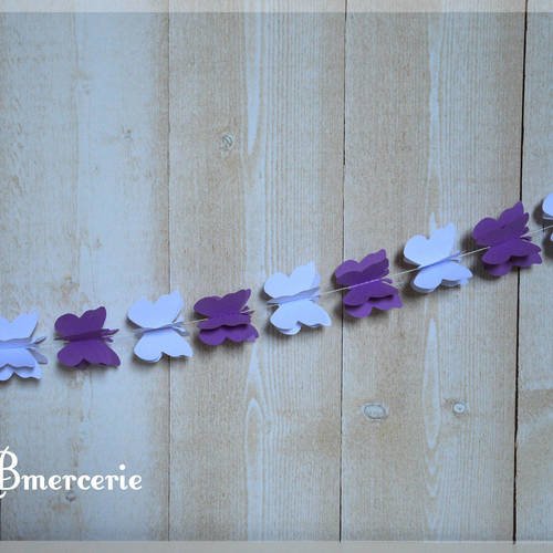 Guirlande en 3d papillons cartonné blanc et violet 1.5 m 