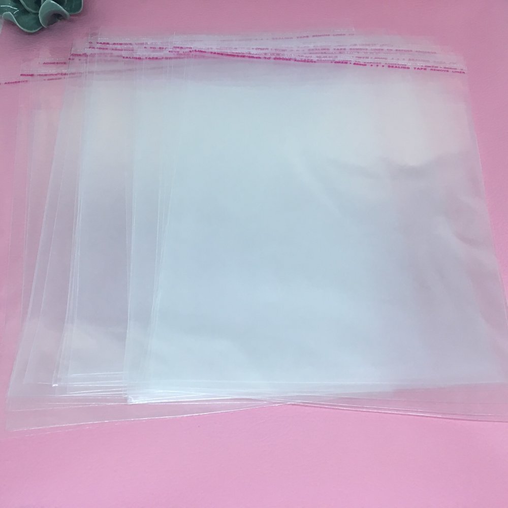 Sachets transparents plats à fermeture autocollante - 18 x 25,3 cm