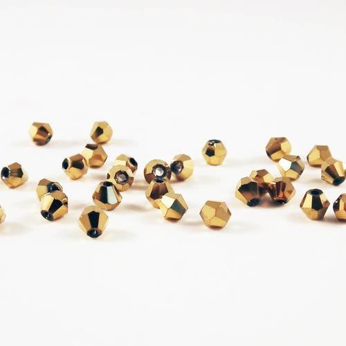 Psm05d - lot de 10 perles à facettes en verre cristal bicône doré gold métallique à reflets électriques 