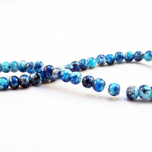 Inv165 - lot de 10 perles en verre ronde bleues gris noir à motifs abstraits asiatiques tribal reflets 