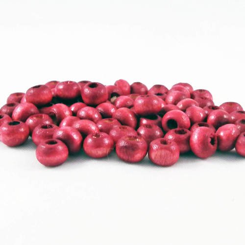Pd50 - lot de 20 perles en bois vieux rose pourpre en forme de rondelles de 6x4mm. 