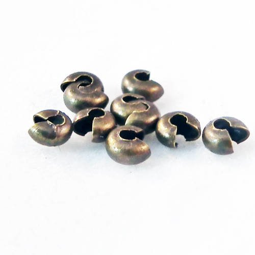Cpe03b - 10 cache-perles à écraser de couleur bronze de 3mm 