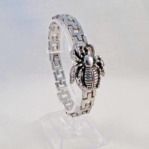 Pu101a - support bracelet style masculin en acier stainless larges maillons motifs araignée 