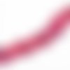Phw10r - une perle howlite tête de mort plate de couleur rose pourpre motifs légères fissures gris noir 