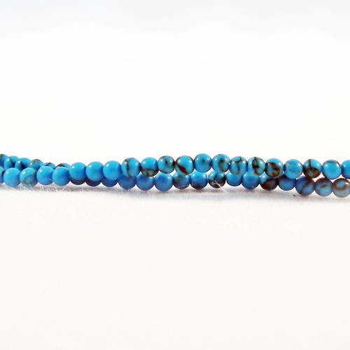 Hw39 - 1 enfilade de perles howlite rondes de 2mm de couleur bleu à fissures motifs noir 