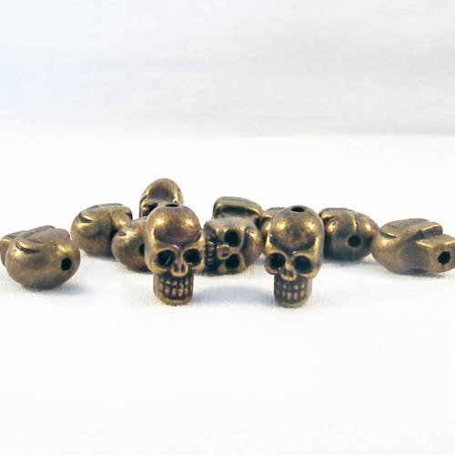 Isp13 - lot de 2 perles intercalaires spacer tête de mort de couleur bronze 