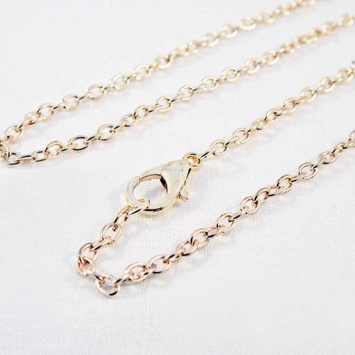 Collier à chaîne 62cm doré légers reflets rosés avec fermoir à mousqueton 