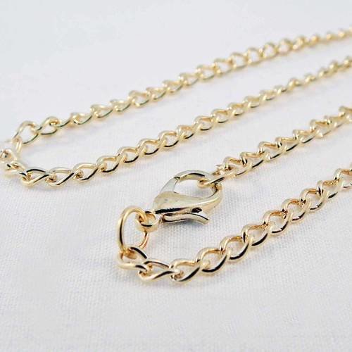 Collier 42cm à chaîne doré légers reflets rosé avec fermoir à mousqueton 