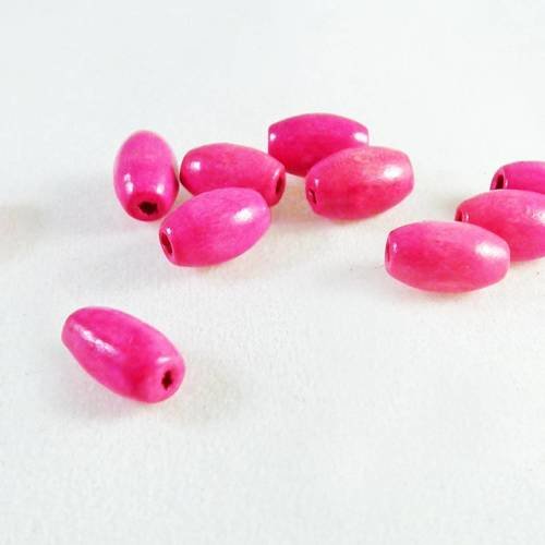 Pbb29 - lot de 10 perles en bois de forme ovales de couleur rose fuchsia 
