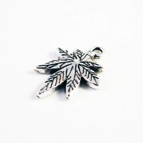 Breloque pendentif 24x14 feuille de cannabis peace love bob marley en argent tibétain 