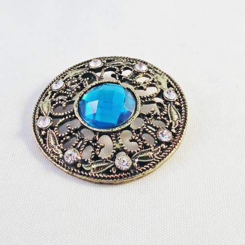 Magnifique pendentif breloque connecteur vintage rond à motifs et cristal bleu et strass bronze 