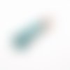 Pompon 55mm en suédine turquoise et embout métal argenté 
