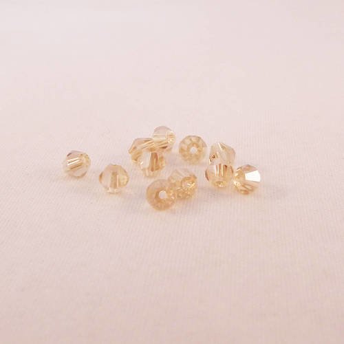 Lot de 10 perles couleur jaune très pâle en verre cristal bicône toupie de 4mm 