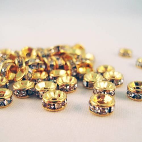 Int139 - lot de 10 perles intercalaires 7mm doré à strass en forme de rondelles 