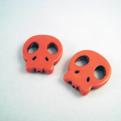 Deux perles howlite tête de mort oranges 