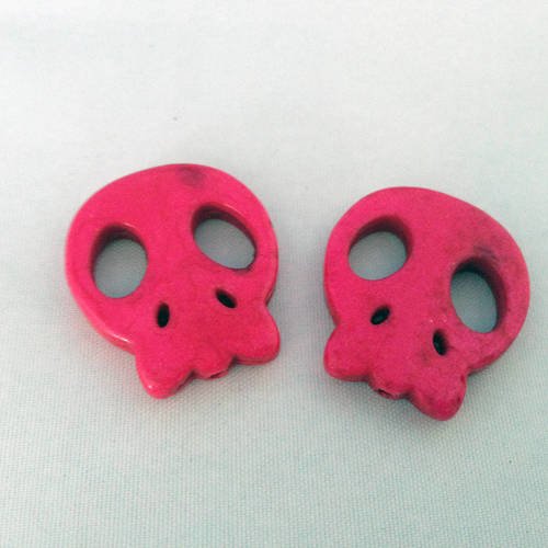 Deux perles howlite tête de mort roses 
