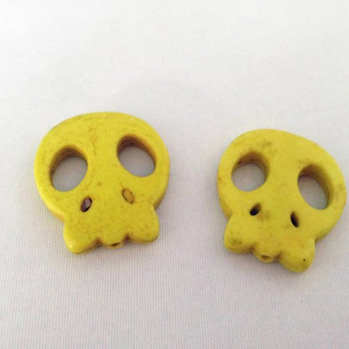 Deux perles howlite tête de mort jaunes 