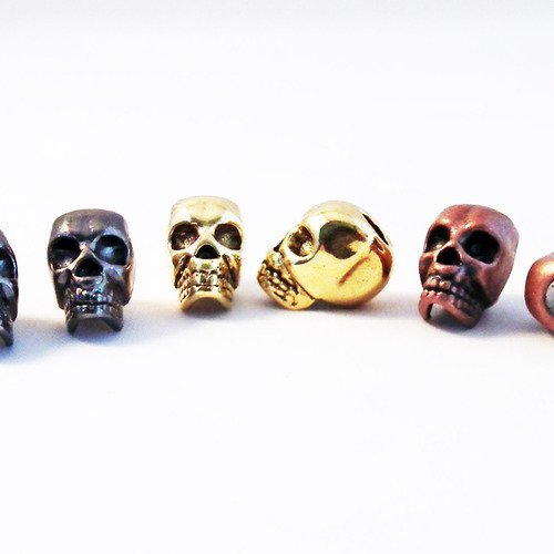 D13 - lot de 2 perles intercalaires spacer tête de mort gunmetal, doré, ou rouge cuivré