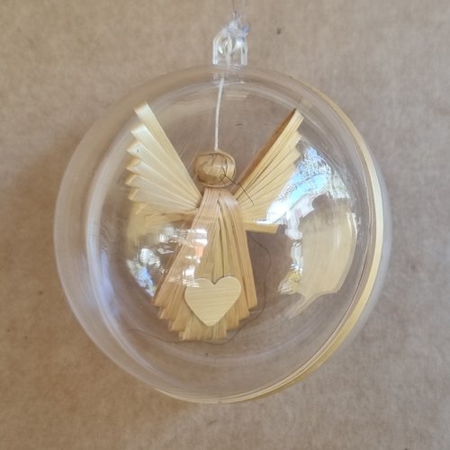 Deux boules de noël renfermant un ange et étoile en paille