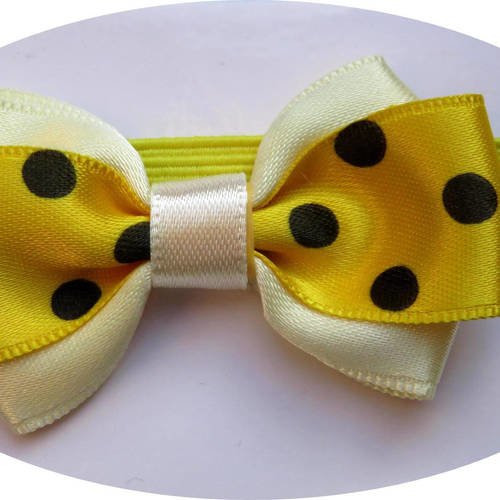 Bandeau headband élastique avec noeud papillon en tissu satin jaune pâle et jaune à gros pois noirs 