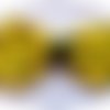 Bandeau headband élastique avec noeud papillon en tissu satin jaune à gros pois noirs