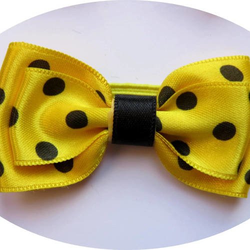 Bandeau headband élastique avec noeud papillon en tissu satin jaune à gros pois noirs