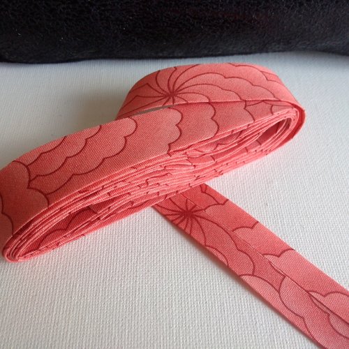 2,30m de biais fantaisie motif abstrait bordeaux sur fond saumon