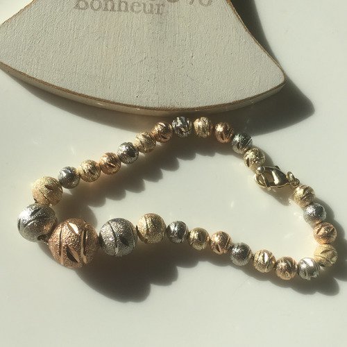 Bracelet perles métal brossé en doré rosé et argenté