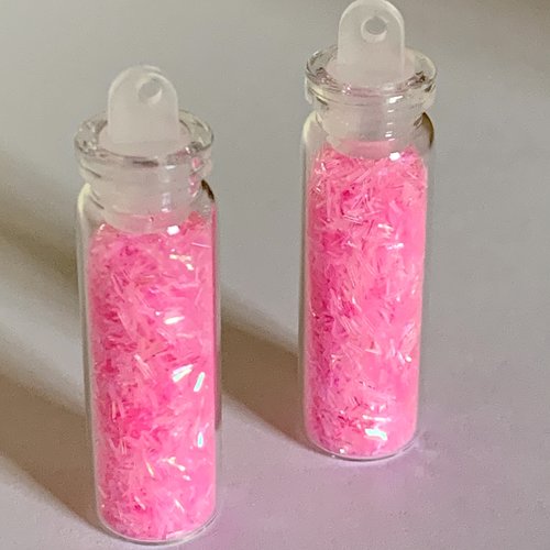 Fioles en verre 4cm avec des micro filaments en rose x2