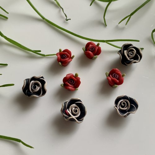 8 perles roses en noir et rouge en fimo