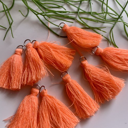 Lot de 2 breloques pompons coton orange vif embout argenté 4 cm