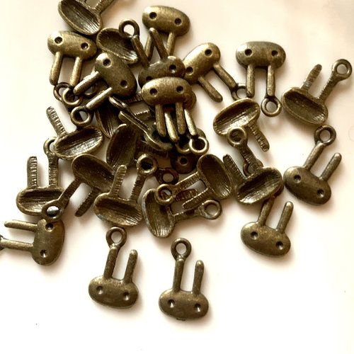 Lot de 28 breloques têtes de robot en bronze 18mm
