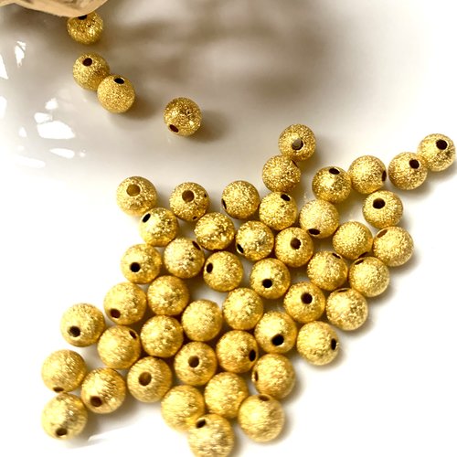 50 perles métal brossées dorées 5mm