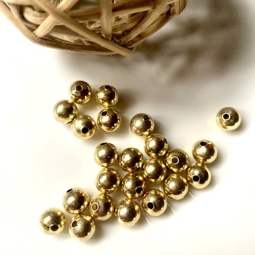 23 perles rondes dorées